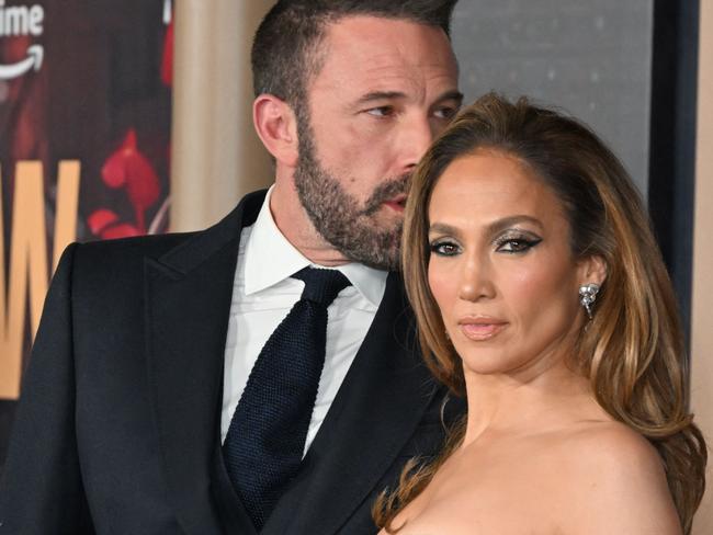(FILES) US actress Jennifer Lopez (R) and US actor Ben Affleck attend Amazon's "This is Me... Now: A Love Story" premiere at the Dolby theatre in Hollywood, California, February 13, 2024. Jennifer Lopez said on May 31, 2024 that she was cancelling her summer tour to spend more time with her family as rumors circulate over a split with actor-husband Ben Affleck. (Photo by Robyn BECK / AFP)