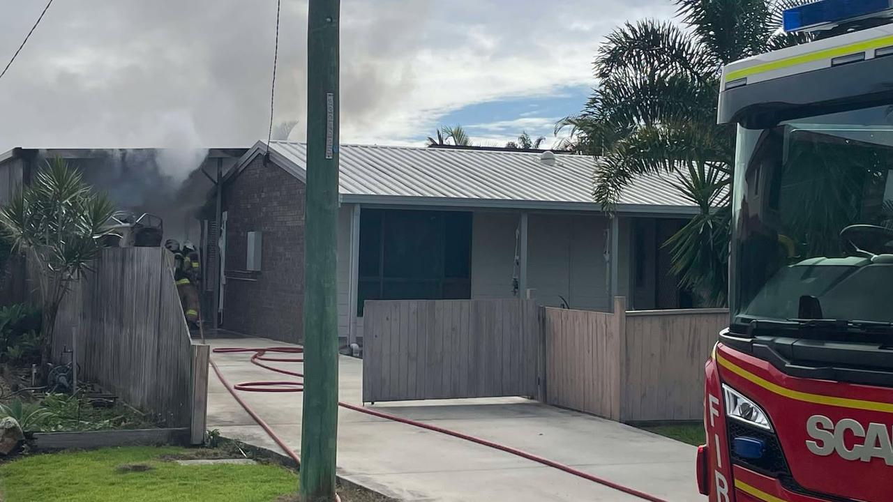 WATCH: Fire destroys boat, threatens home