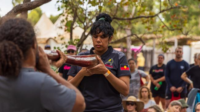 People take part in the Yidaki (didgeridoo) Healing. Picture: Tamati Smith/ Getty Images