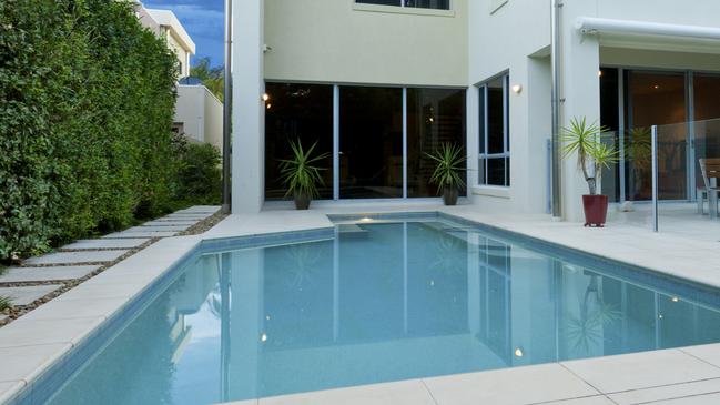 Swimming pools require safety certification under NSW regulations.