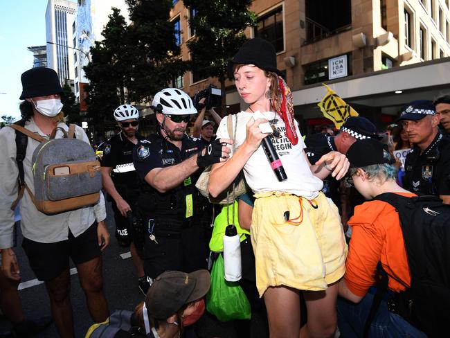 Protester Emma Dorge being dealt with by police/ Picture: NCA NewsWire / Dan Peled