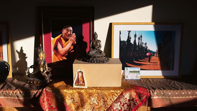 The couple’s treasured mementos of Thailand and Buddhist artefacts. Picture: Sean Davey