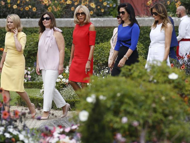 The first ladies take a walk in Biarritz, southwestern France, during the G7 summit. Picture: AP