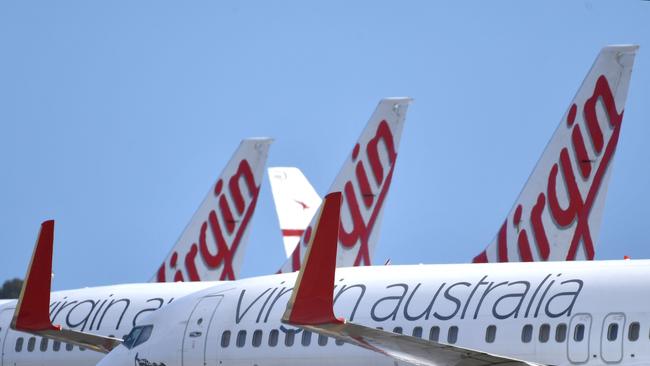 Virgin Australia planes parked on the tarmac at Adelaide Airport. Picture: AAP