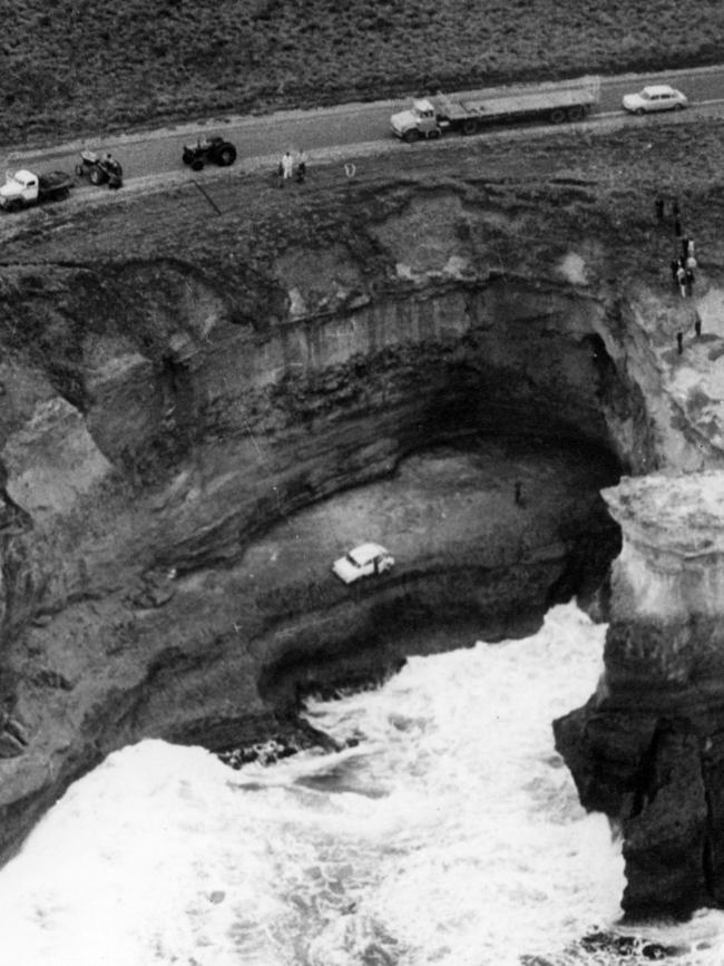 The family car containing the bodies of Crawford's wife and children at the bottom of the cliff at Port Campbell.