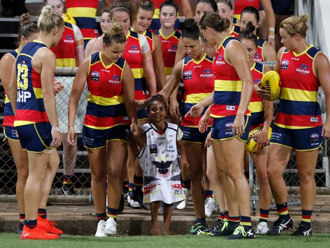 The Crows run onto the ground during the 2019 NAB AFLW Round 4 match between Adelaide and Fremantle at TIO Stadium on February 23, 2019 in Darwin, Australia. Picture: MICHAEL WILLSON/AFL MEDIA