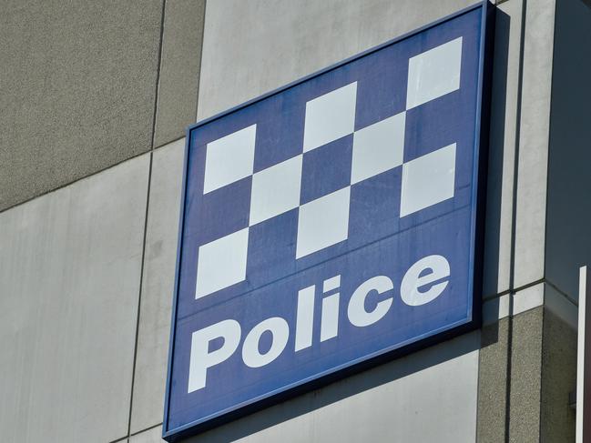 'Police' signage is seen at the Police Headquarters on Angas Street in Adelaide, Monday, April 2, 2018. (AAP Image/Morgan Sette) NO ARCHIVING