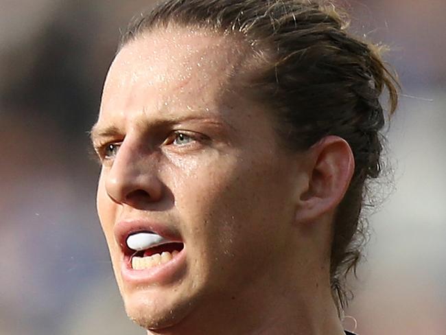 PERTH, AUSTRALIA - MAY 27: Nathan Fyfe of the Dockers looks to pass the ball during the round 10 AFL match between the Fremantle Dockers and the North Melbourne Kangaroos at Optus Stadium on May 27, 2018 in Perth, Australia.  (Photo by Paul Kane/Getty Images)