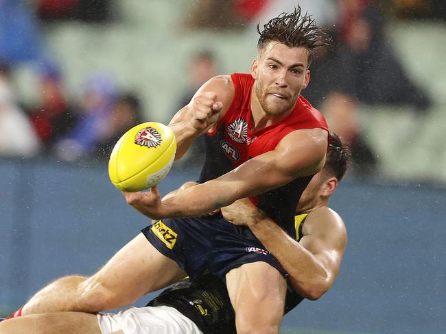 AFL Round 6.   24/04/2021.  Melbourne vs Richmond at the MCG, Melbourne.  Jack Viney of the Demons tackled by Richmonds Noah Balta during the 2nd qtr.   . Pic: Michael Klein