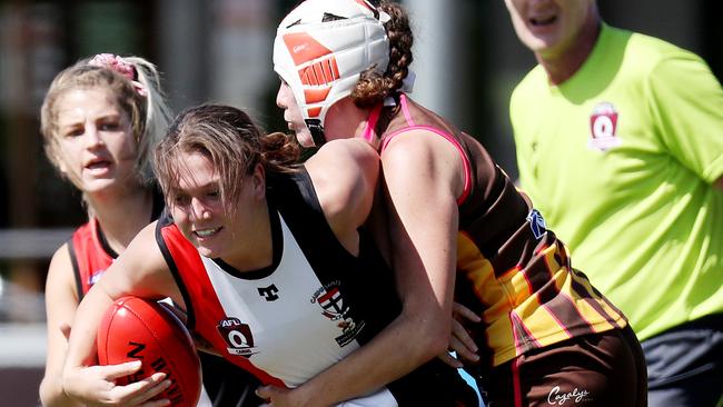 AFL Cairns Womens Manunda Hawks vs Cairns Saints at Cazalys. Saints' Poppy Boltz and Hawks' Virginia King. PICTURE: STEWART McLEAN