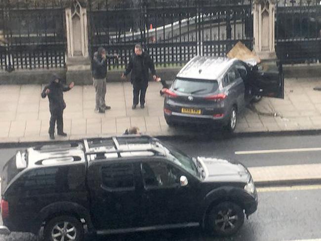 The car responsible is seen on Bridge Street near the UK Houses of Parliament in London. Picture: AP