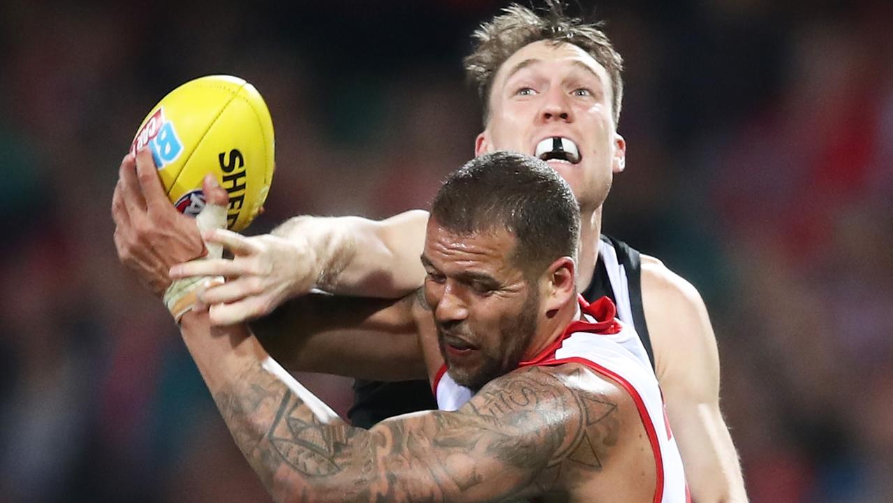 Jack Madgen spoils Lance Franklin during his AFL debut in 2018. (Photo by Matt King/AFL Media/Getty Images)