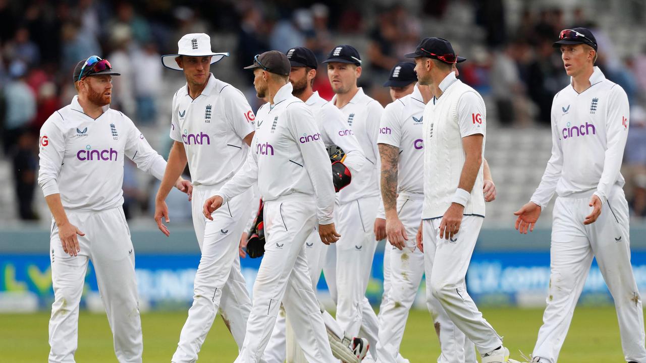 England players leave the pitch at the end of play on the second day of the first cricket Test match between England and New Zealand at Lord's cricket ground in London on June 3, 2022. (Photo by Ian Kington / AFP) / RESTRICTED TO EDITORIAL USE. NO ASSOCIATION WITH DIRECT COMPETITOR OF SPONSOR, PARTNER, OR SUPPLIER OF THE ECB