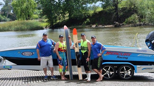 Steve Price, Coach of St George Illawarra Dragons , pictured 2nd from right, preparing to ski the Bridge to bridge race for charity with the boat donated for the trip. pic supplied.