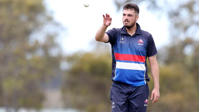 Tim Hughes bowling for Footscray. Picture: George Salpigtidis