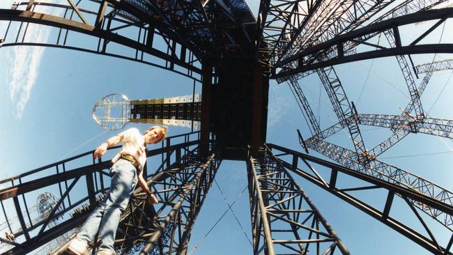 Builder Steve Howard at work on the 170-tonne, nine-storey stage for the Rolling Stones’ Football Park show.