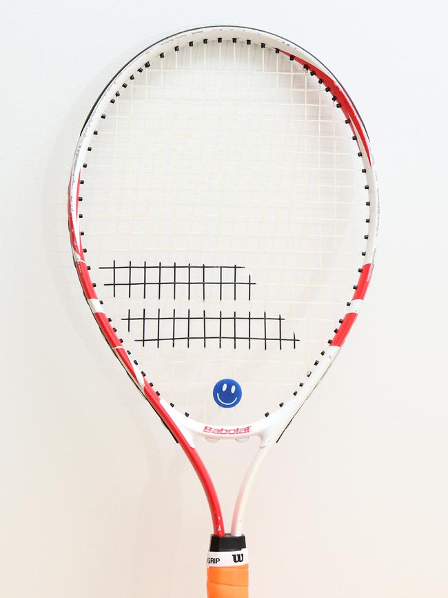 A tennis racket. Picture: Steve Pohlner