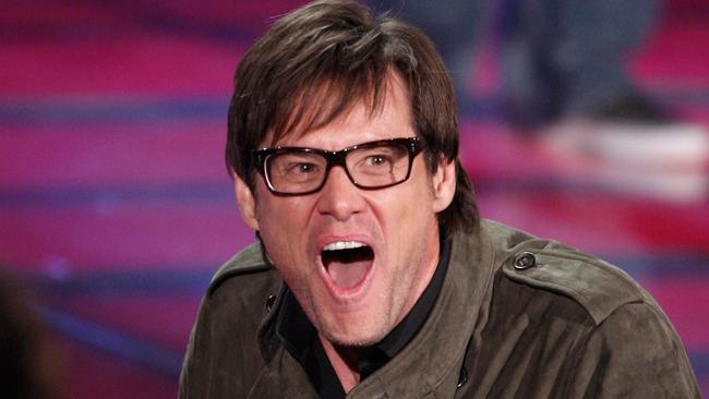 Actor Jim Carrey accepts the Best Comedic Performance award onstage during the 18th Annual MTV Movie Awards held at the Gibson Amphitheatre on May 31, 2009 in Universal City, California. Kevin Winter/Getty Images/AFP == FOR NEWSPAPERS, INTERNET, TELCOS & TELEVISION USE ONLY ==