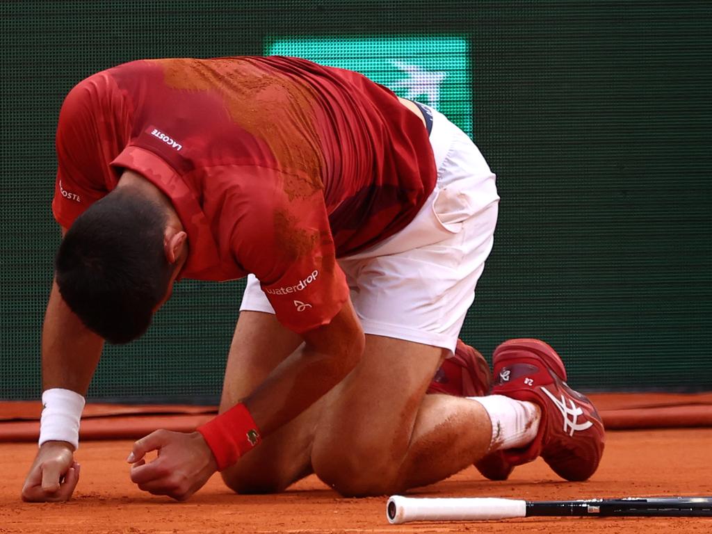 Serbia's Novak Djokovic reacts after falling on the court during his men's singles round of sixteen match against Argentina's Francisco Cerundolo on Court Philippe Chatrier. Picture: AFP