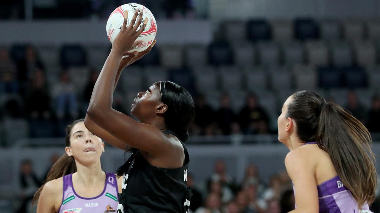 Shimona Nelson of the Magpies shoots with empty stands in the background during the round four Super Netball match between Collingwood Magpies and Queensland Firebirds at John Cain Arena. Photo: Getty Images