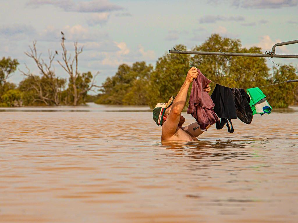 Flood waters from Tropical Cyclone Kirrily have reached Birdsville with those in the area having some fun in the water. Picture: Peta Rowlands Wangkangurru/Yarluyandi Traditional Owner of Birdsville