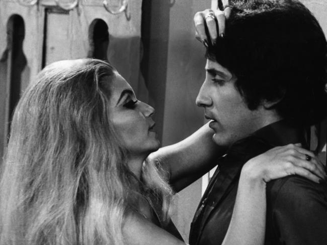 <h2>1972</h2>A memorable year in Australian television - with the at-times raunchy Number 96 heating up loungerooms across the nation. Pictured are Number 96 icons Joe Hasham and Abigail. <a href=