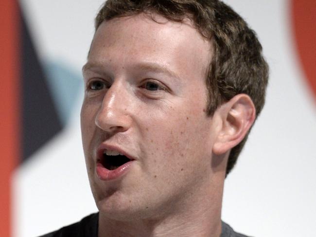 (FILES) This file photo taken on March 2, 2015 shows Facebook's creator Mark Zuckerberg on the opening day of the 2015 Mobile World Congress (MWC) in Barcelona. Facebook chief Mark Zuckerberg on November 10, 2016 rejected the idea that bogus stories shared at the social network paved a path of victory for President-elect Donald Trump."The idea that fake news on Facebook, which is a very small amount of the content, influenced the election in any way I think is a pretty crazy idea," Zuckerberg said during an on-stage chat at a Technonomy technology trends conference in California. / AFP PHOTO / LLUIS GENE