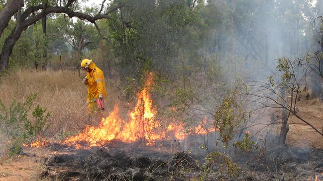 Rural Firefighter using a drip torch during a hazard reduction burn. Picture: Supplied