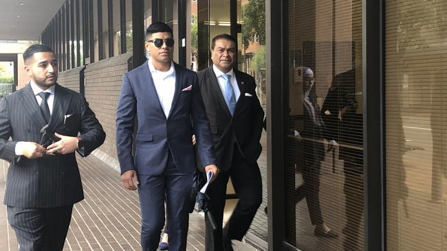 Julian Sebastiao (centre) leaves Parramatta Local Court after being convicted of glassing his former partner.