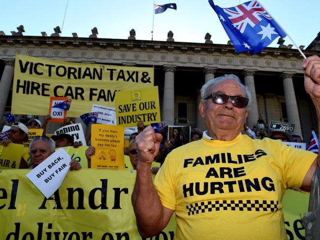 Taxi owner and driver John protests on the steps of Parliament. Picture: Nicole Garmston