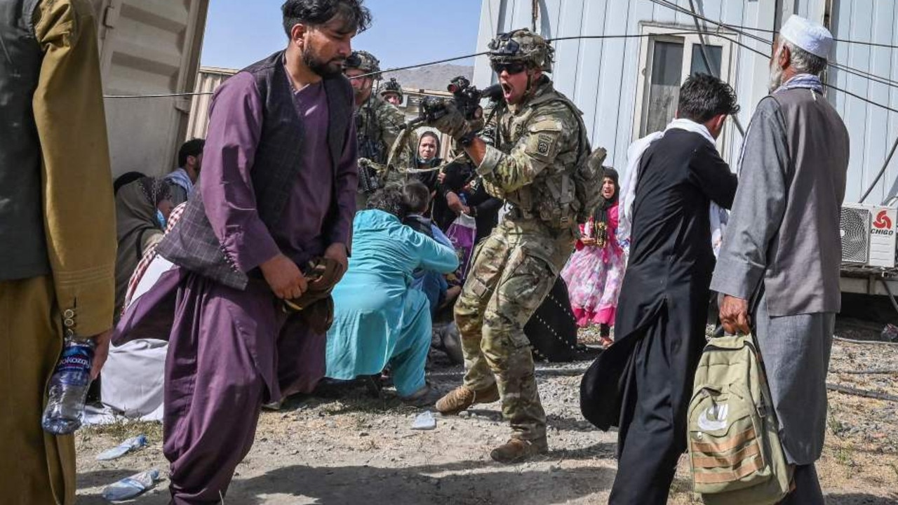 A US soldier points his gun as they protect Kabul airport. Picture: AFP