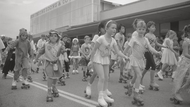 Roller skaters on Knuckey St, Darwin during the Bougainvillea parade taken on June 2, 1990. Picture: Library &amp; Archives NT