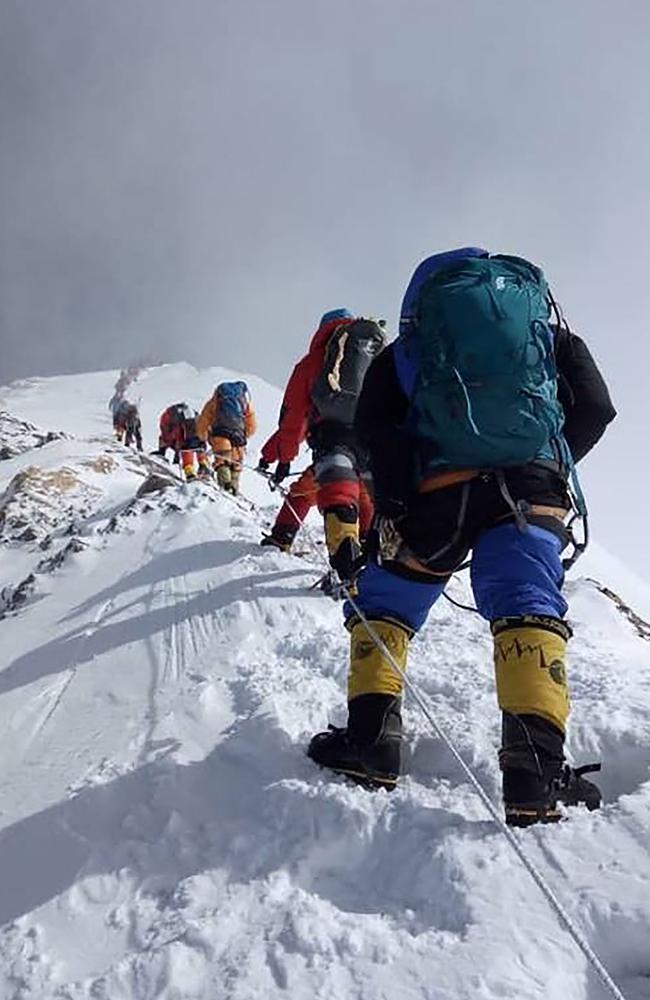 Less oxygen in the air makes climbing Everest tough going. Picture: Gesman TAMANG / AFP