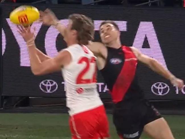 Essendon skipper and Brownlow Medal fancy Zach Merrett accidentally collects Nick Blakey high. The Swan had an HIA. Will Merrett face MRO strife?