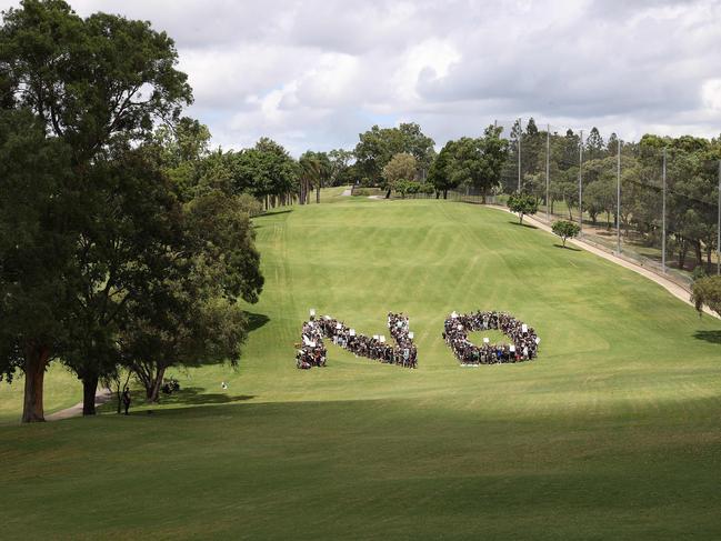 Victoria Park Olympic stadium protesters join forces to form giant human “NO”. Picture: Liam Kidston