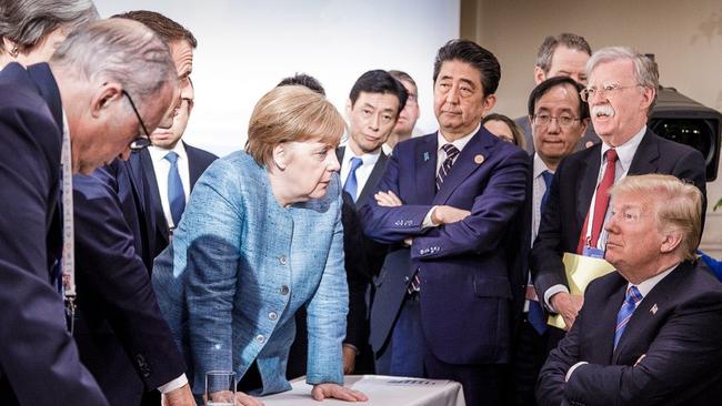 The image of Trump surrounded by Angela Merkel and other G7 leaders swept social media. (Pic: Jesco Denzel)