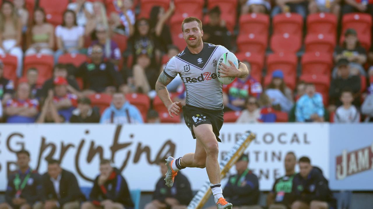 NEWCASTLE, AUSTRALIA - MAY 01: Cameron Munster of the Storm scores a try during the round eight NRL match between the Newcastle Knights and the Melbourne Storm at McDonald Jones Stadium, on May 01, 2022, in Newcastle, Australia. (Photo by Ashley Feder/Getty Images)