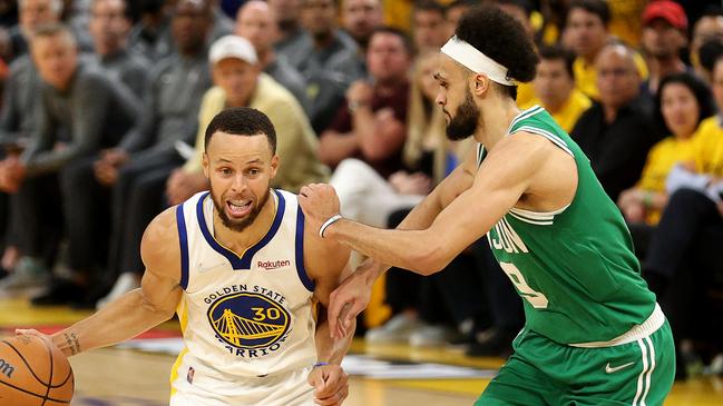 SAN FRANCISCO, CALIFORNIA - JUNE 05: Stephen Curry #30 of the Golden State Warriors drives against Derrick White #9 of the Boston Celtics during the second quarter in Game Two of the 2022 NBA Finals at Chase Center on June 05, 2022 in San Francisco, California. NOTE TO USER: User expressly acknowledges and agrees that, by downloading and/or using this photograph, User is consenting to the terms and conditions of the Getty Images License Agreement. (Photo by Ezra Shaw/Getty Images)