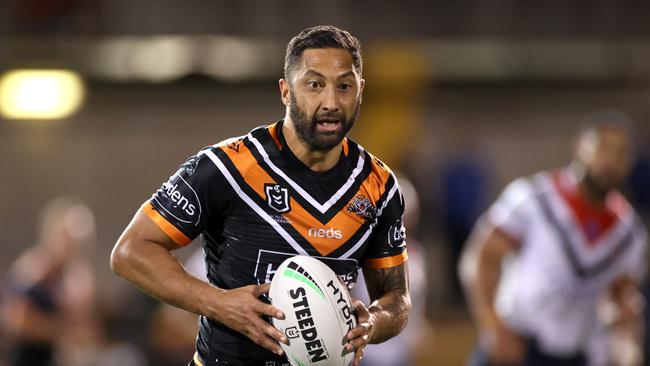 SYDNEY, AUSTRALIA - AUGUST 22: Benji Marshall of the Tigers makes a break during the round 15 NRL match between the Wests Tigers and the Sydney Roosters at Leichhardt Oval on August 22, 2020 in Sydney, Australia. (Photo by Cameron Spencer/Getty Images)