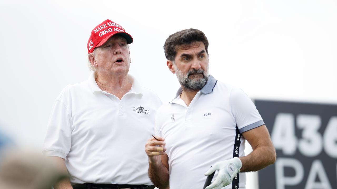 BEDMINSTER, NEW JERSEY - JULY 28: Former U.S. President Donald Trump and Yasir al-Rumayyan, head of the sovereign wealth fund of Saudi Arabia, look on from the second tee during the pro-am prior to the LIV Golf Invitational - Bedminster at Trump National Golf Club Bedminster on July 28, 2022 in Bedminster, New Jersey. Cliff Hawkins/Getty Images/AFP == FOR NEWSPAPERS, INTERNET, TELCOS &amp; TELEVISION USE ONLY ==