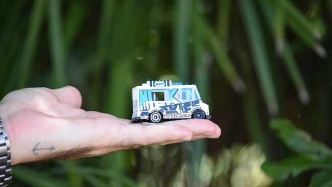 Cliff 'CK' Kern from PUFT Events holding a replica of the $10K golden toy truck hidden in Townsville.
