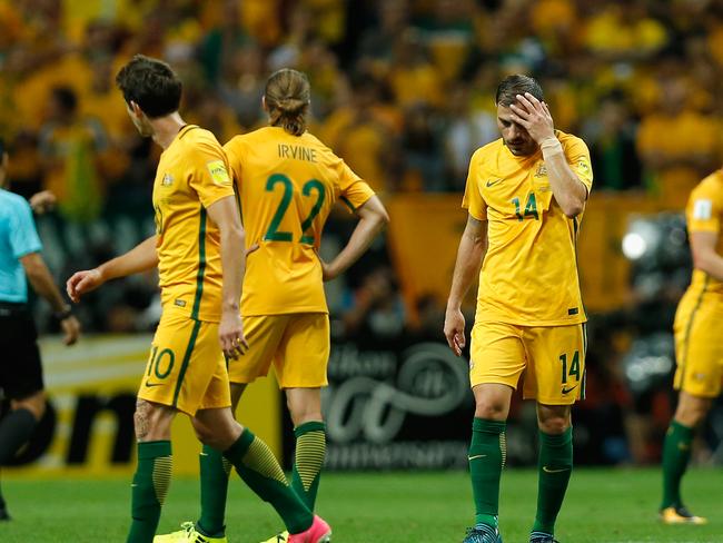 SAITAMA, JAPAN - AUGUST 31:  Australia players show dejection after Japan's first goal during the FIFA World Cup Qualifier match between Japan and Australia at Saitama Stadium on August 31, 2017 in Saitama, Japan.  (Photo by Kiyoshi Ota/Getty Images)