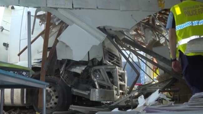 The truck driver was trapped in his cabin for about 40 minutes. Picture: 7News