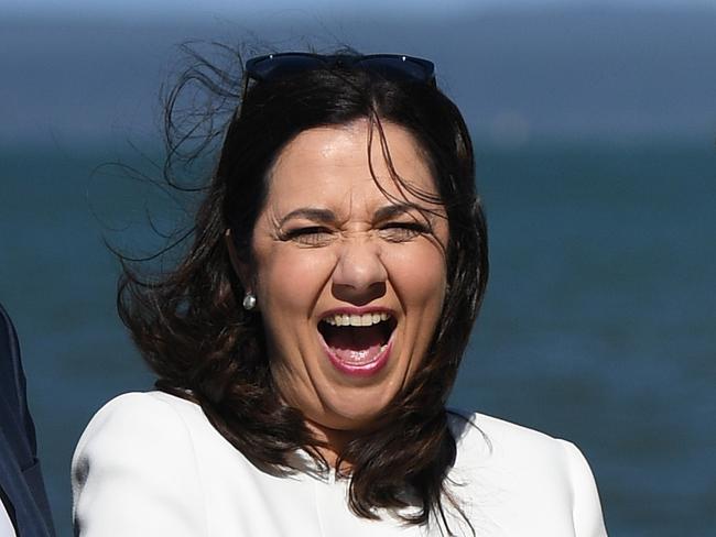 Queensland Premier Annastacia Palaszczuk laughs as she poses for a photo after meeting Labor volunteers in Brisbane, Friday, November 24, 2017. Ms Palaszczuk is on the campaign trail ahead of tomorrow's state election. (AAP Image/Dan Peled) NO ARCHIVING