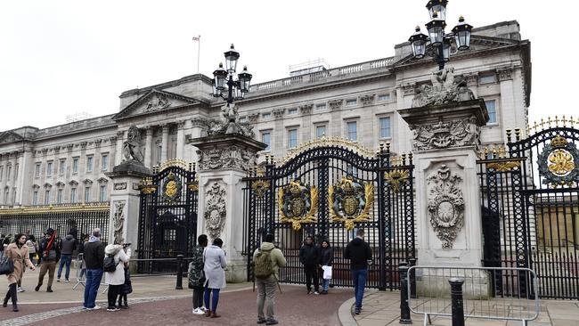 Members of the public gather outside of Buckingham Palace on Sunday. Picture:Stuart C. Wilson/Getty Images