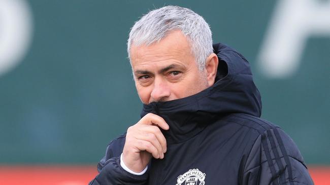 Manchester United's Portuguese manager Jose Mourinho looks on during a training session at the Carrington Training complex in Manchester, north west England on the eve of their Champions league group stage football match against Valencia on December 11, 2018. (Photo by Lindsey PARNABY / AFP)