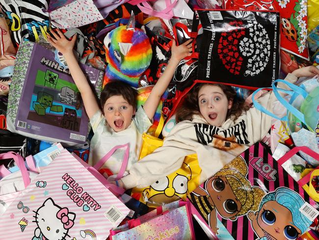 The large selection of Showbags that will be on offer at this year's Melbourne Royal Show. Siblings Harry 6 and Cate 9 work their way through all the showbags on offer to find their favourite bag.                     Picture: David Caird