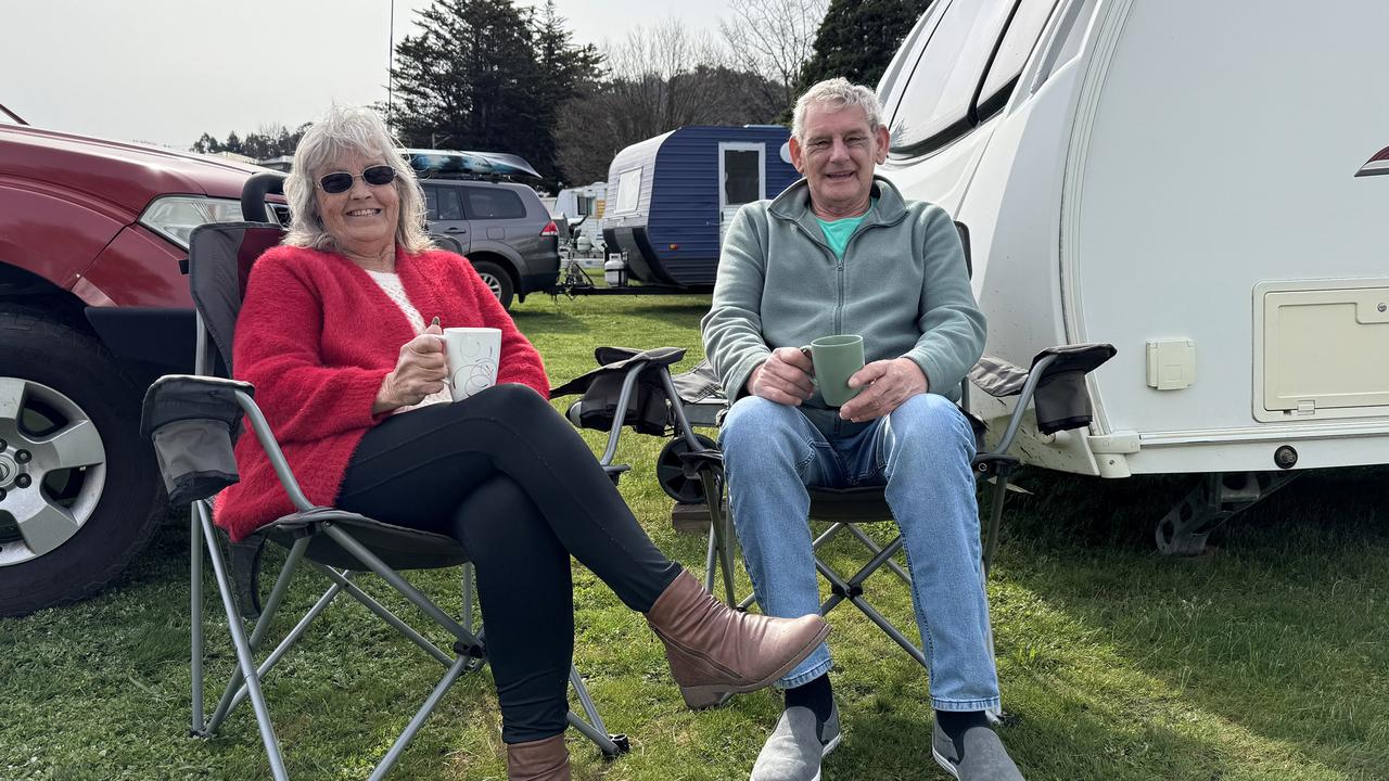 Di and Dave Bond relaxing at Boyer Oval, New Norfolk, after being evacuated from the New Norfolk Caravan Park due to flooding. Picture: Damian Bester/New Norfolk News