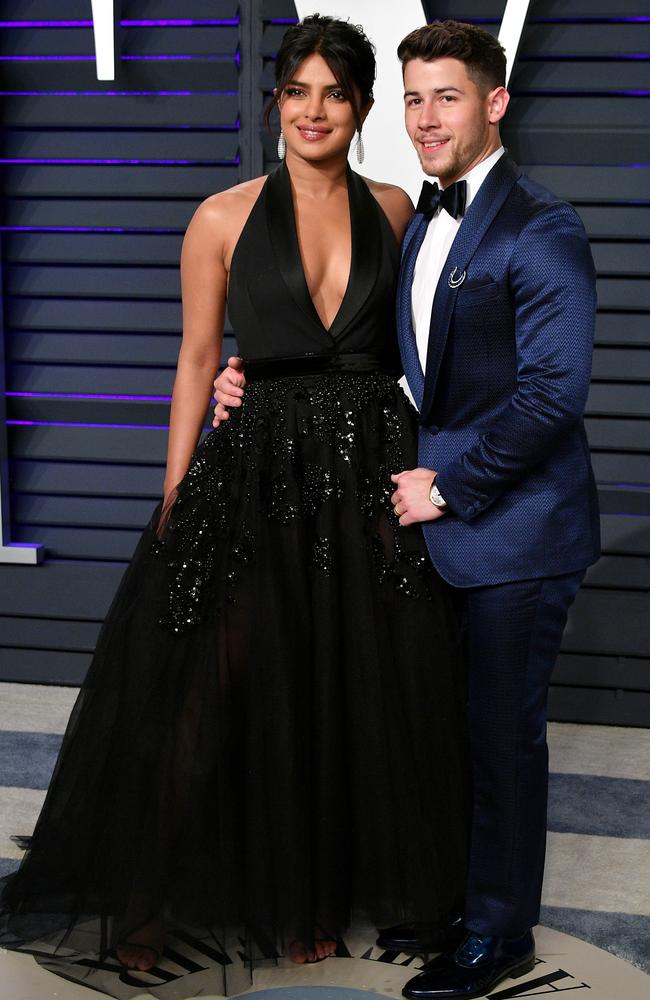 Priyanka Chopra (L) and Nick Jonas attend the 2019 Vanity Fair Oscar Party hosted by Radhika Jones at Wallis Annenberg Center for the Performing Arts on February 24, 2019 in Beverly Hills, California. (Photo by Dia Dipasupil/Getty Images)