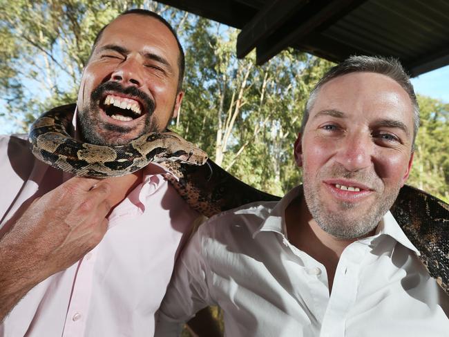 Sydney Zoo CEO Jake Burgess and Western Sydney University’s Dr Andy Marks with Bethany the anaconda.